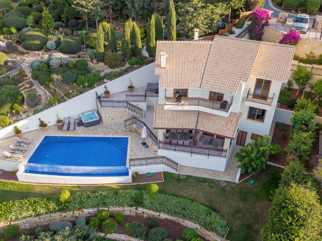 an aerial view of a house with a swimming pool at Villa HERMIONA in Kouklia