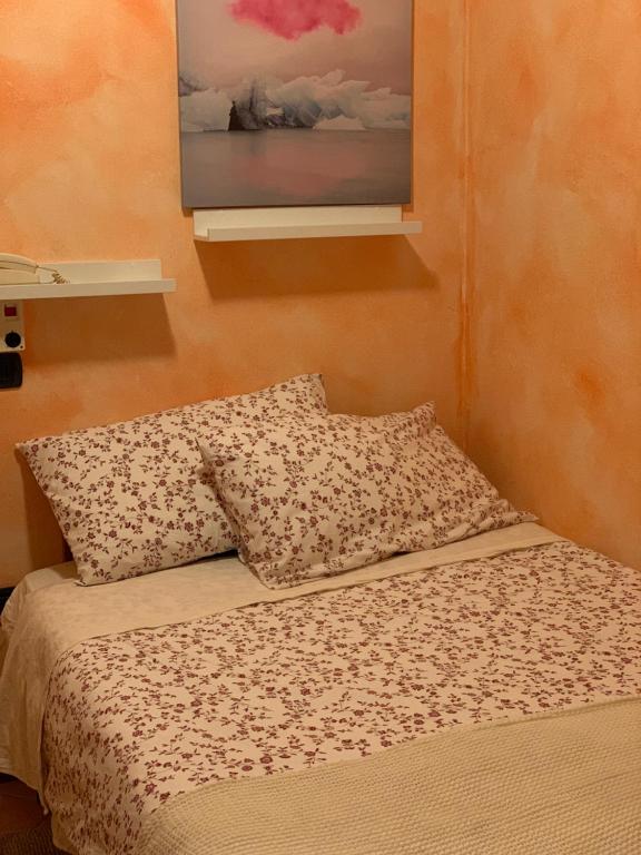 Postel nebo postele na pokoji v ubytování Albergo Ristorante Brera