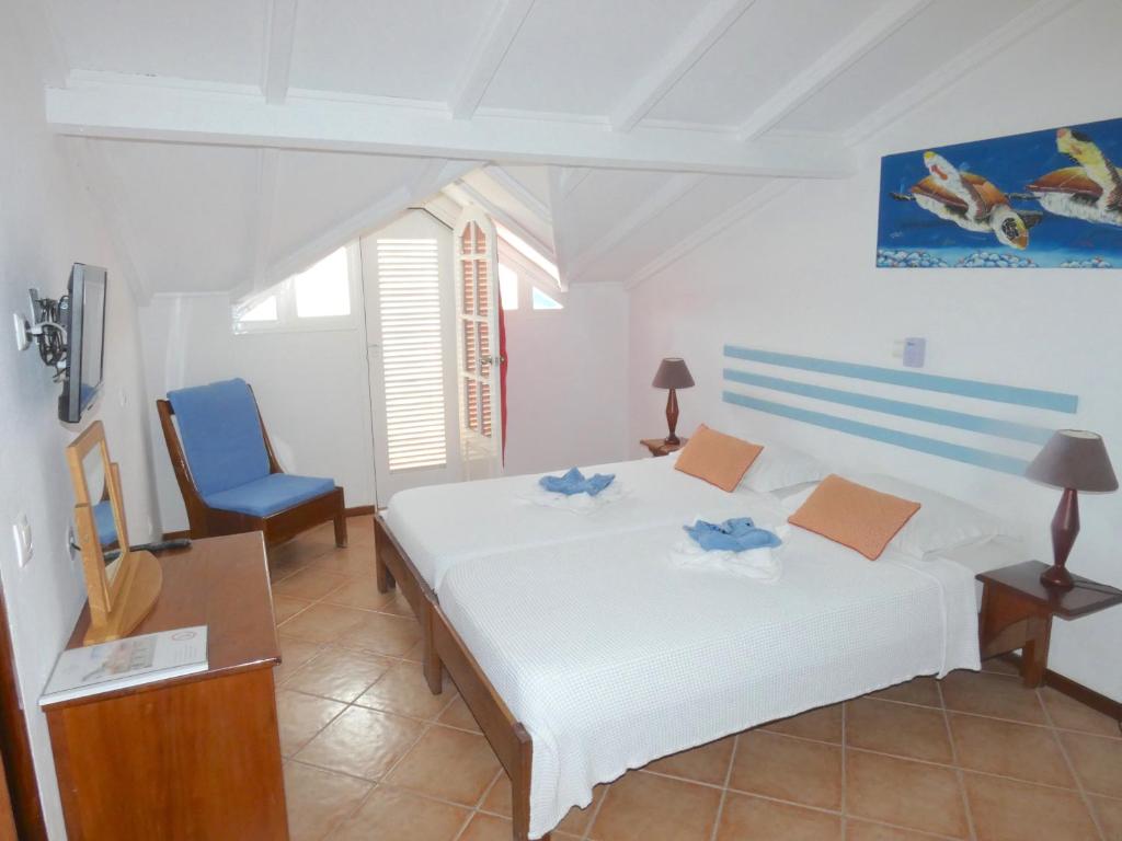 Postel nebo postele na pokoji v ubytování Hotel MiraBela