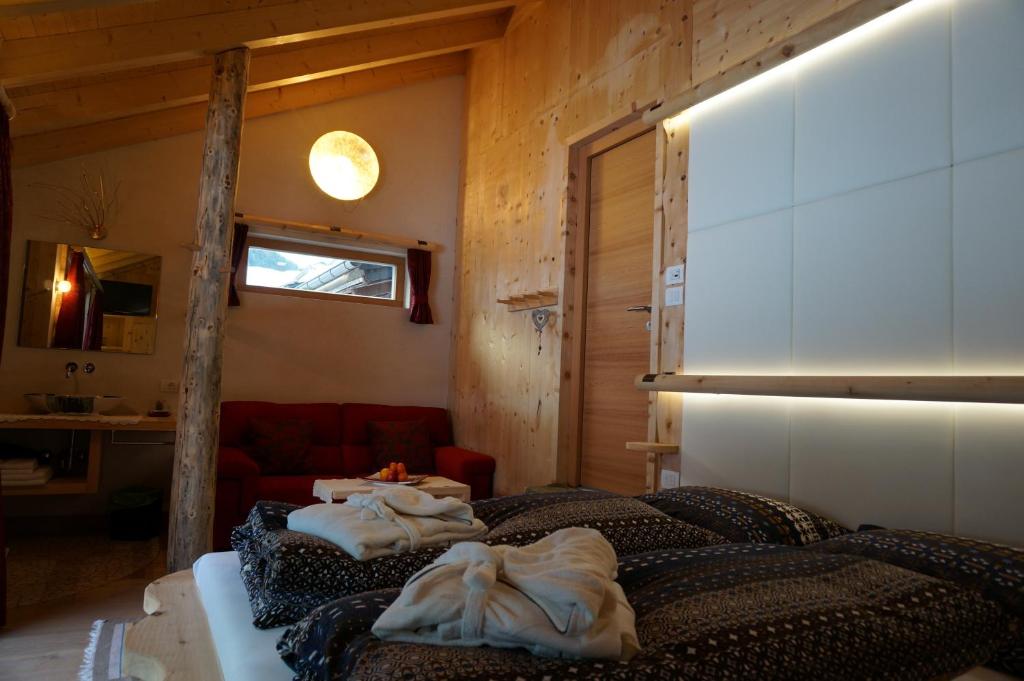 Postel nebo postele na pokoji v ubytování La Ücia by Fana Ladina