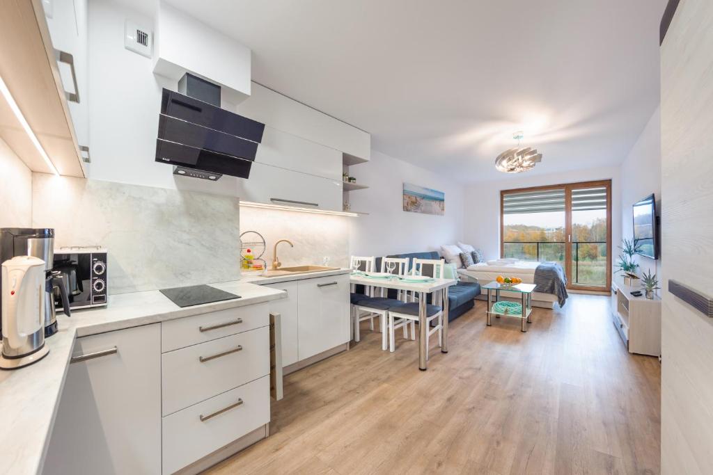 Apartamenty Sun & Snow Kołobrzeg Resorts z basenem - Studio Apartment
