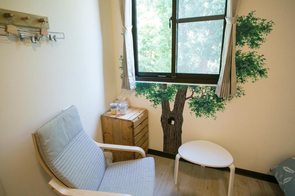 Posezení v ubytování Tree House Café & Homestay