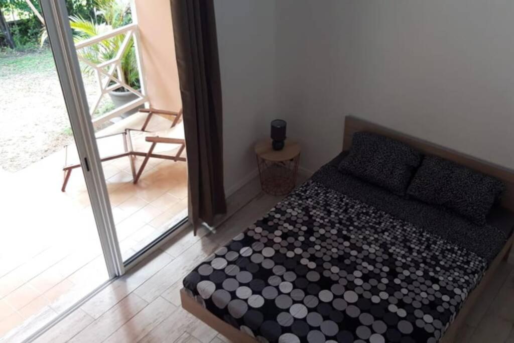 Postel nebo postele na pokoji v ubytování Résidence Ti'Kéol - Appartements avec terrasse 2 à 4 personnes, piscine