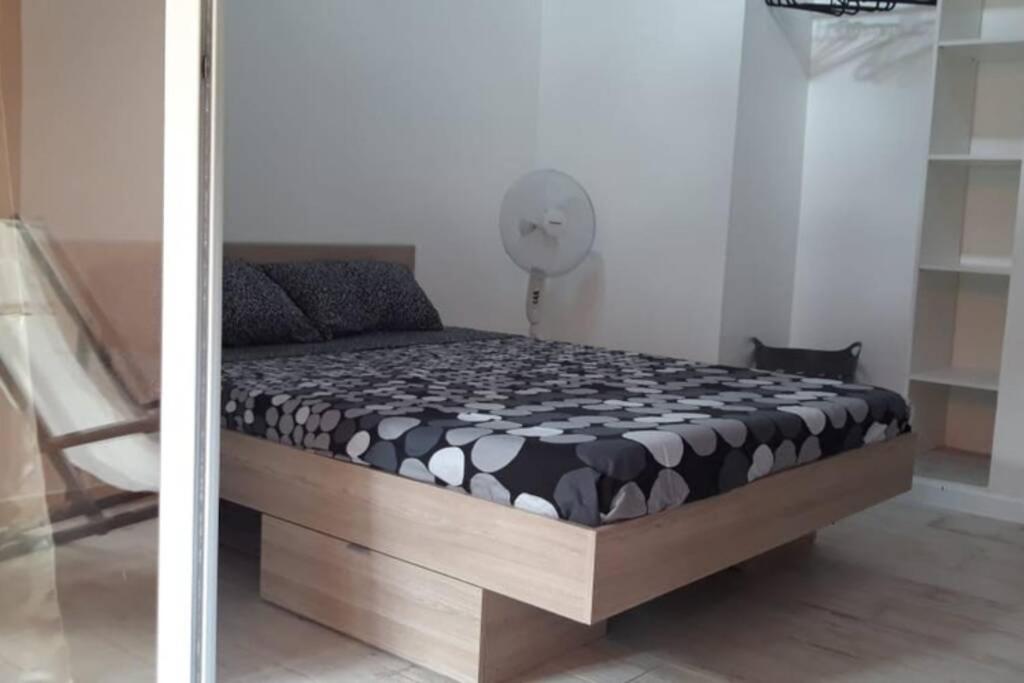 Postel nebo postele na pokoji v ubytování Résidence Ti'Kéol - Appartements avec terrasse 2 à 4 personnes, piscine