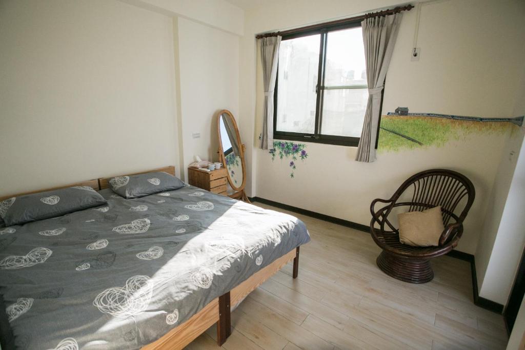 Postel nebo postele na pokoji v ubytování Tree House Café & Homestay