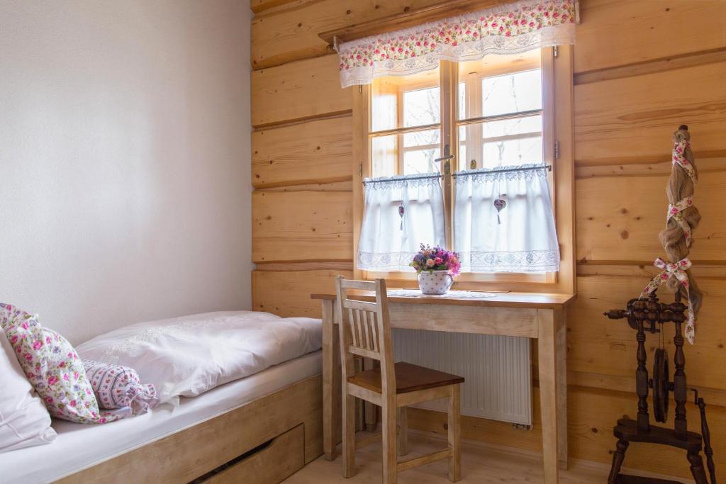 Postel nebo postele na pokoji v ubytování Roubenka Štěpánka