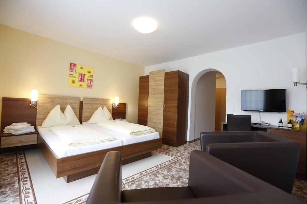 Postel nebo postele na pokoji v ubytování Premium Wanderhotel Steirerhof