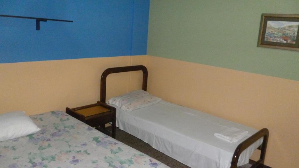 Postel nebo postele na pokoji v ubytování Villa Celeste