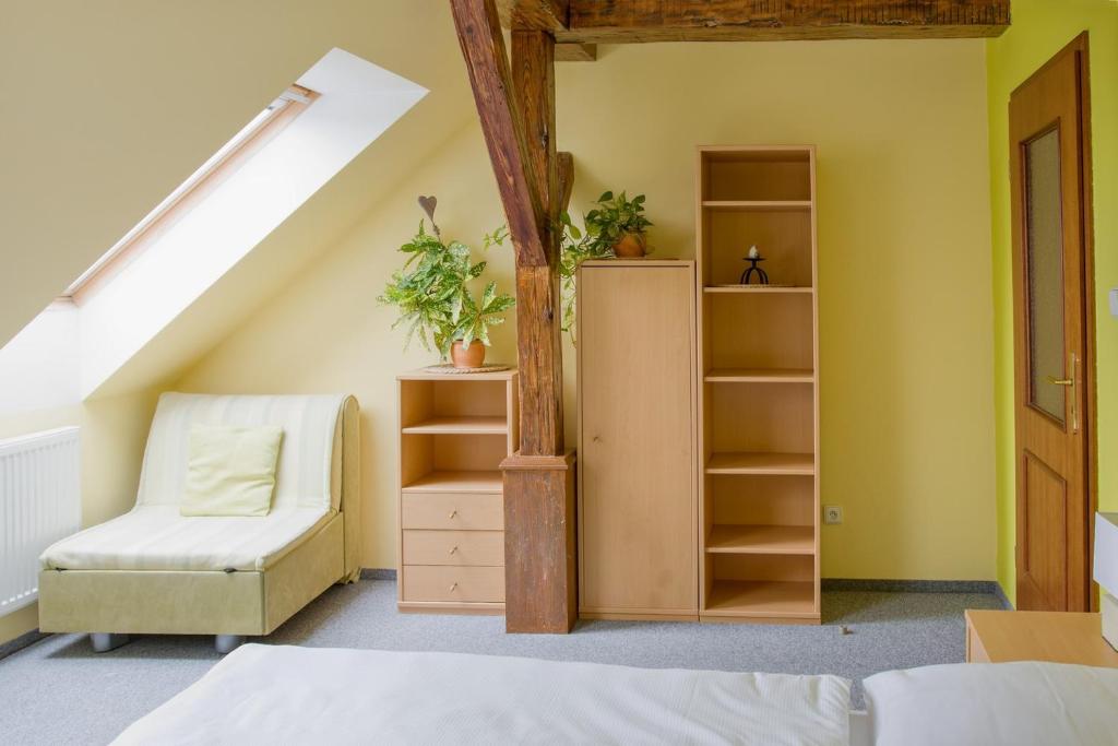 Postel nebo postele na pokoji v ubytování Apartmany A.Ša Kašperské Hory