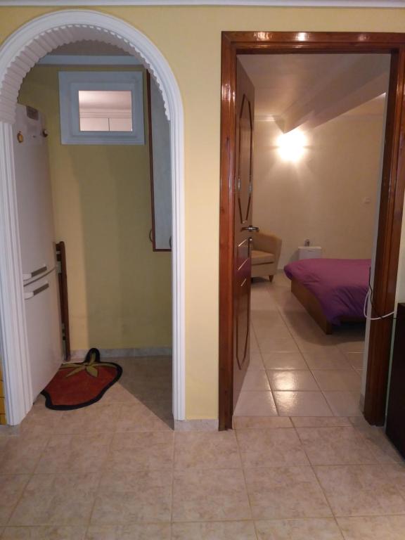 Postel nebo postele na pokoji v ubytování Marmari vacation flat