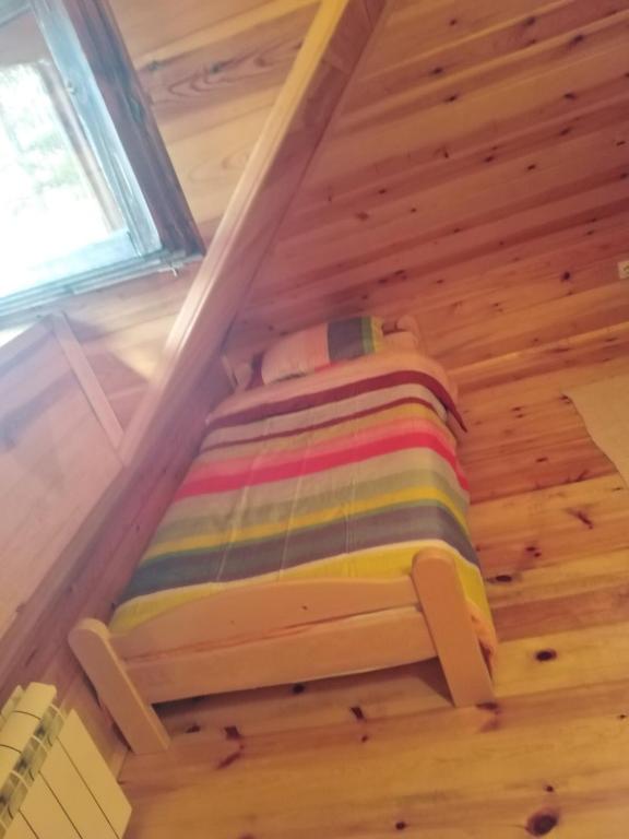 Una cama o camas en una habitación de Apartmani Milojević