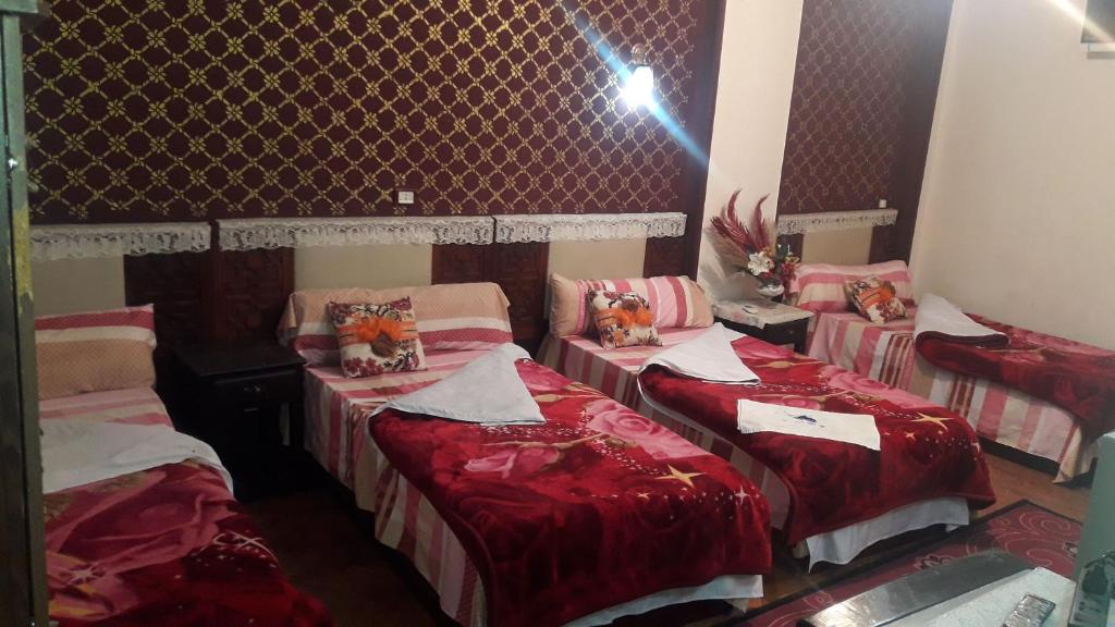 Postel nebo postele na pokoji v ubytování Cairo Moon Hostel