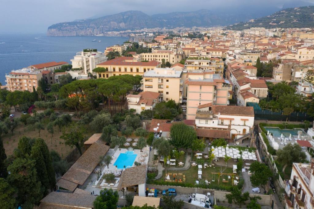 an aerial view of a city with a pool at Casa Lucia in Sorrento