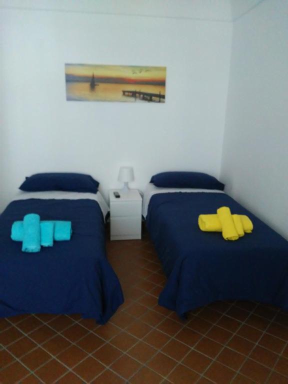 Postel nebo postele na pokoji v ubytování B&B Piazza San Benedetto