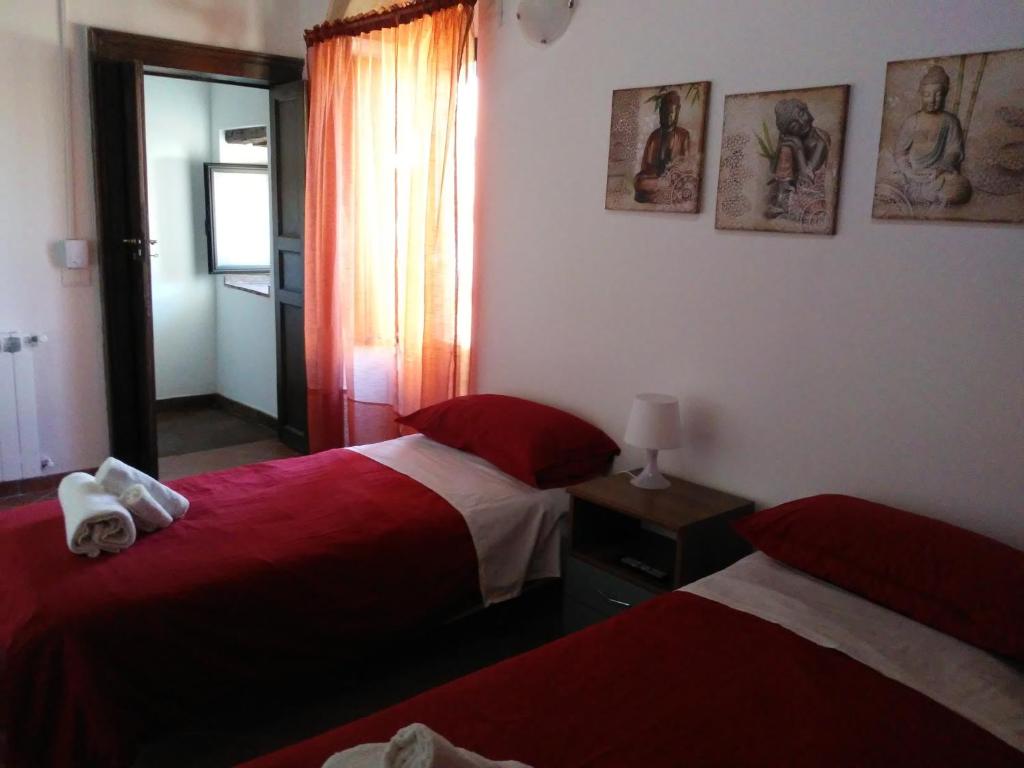 Postel nebo postele na pokoji v ubytování B&B Piazza San Benedetto