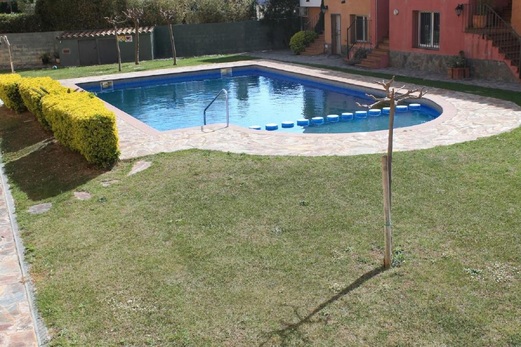 Bazén v ubytování casa cerca playa con piscina comunitaria ref 252 nebo v jeho okolí