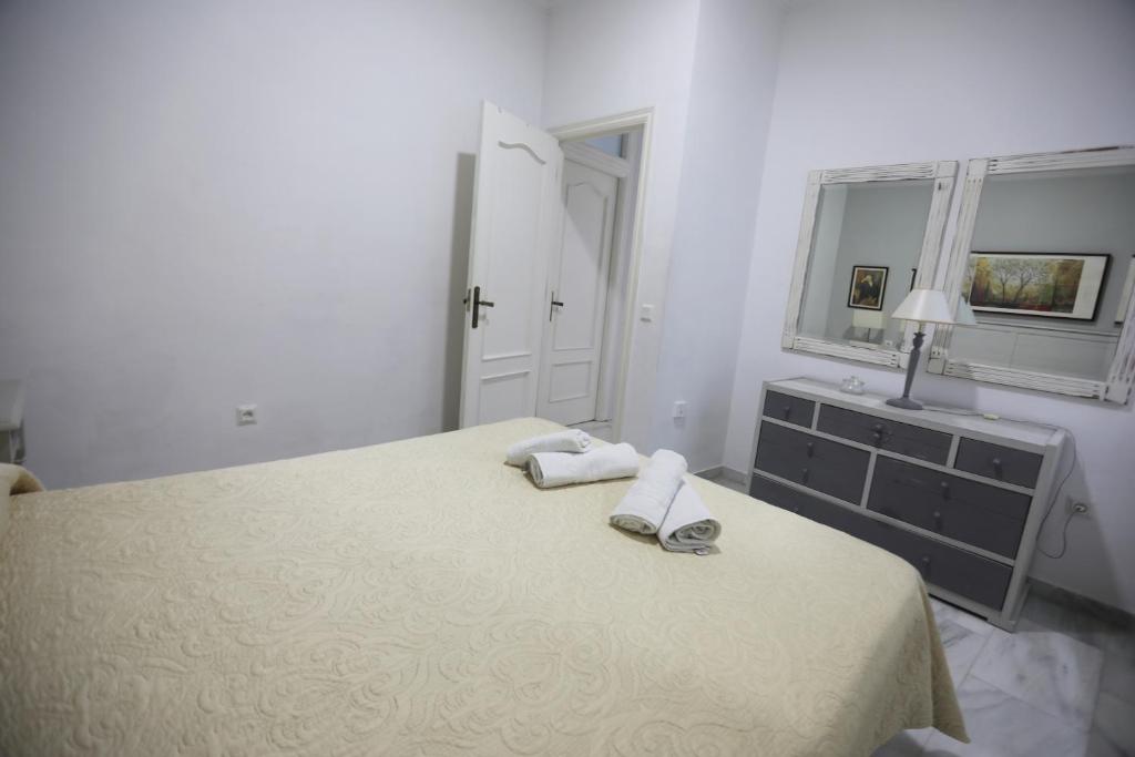 Łóżko lub łóżka w pokoju w obiekcie Apartamento Mar de Korus