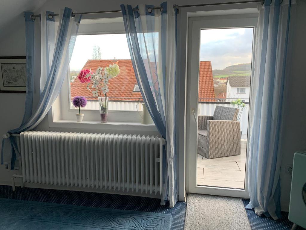 an open window with a view of a balcony at Ferienwohnung Central No.1 in Bad Wildungen