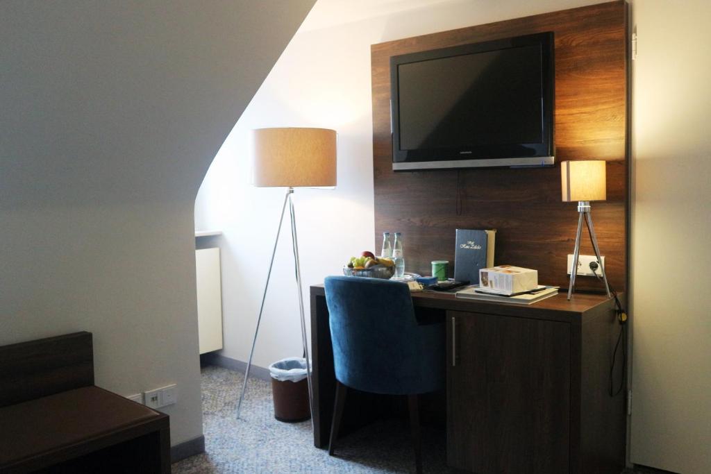 TV a/nebo společenská místnost v ubytování Hotel Haus Delecke