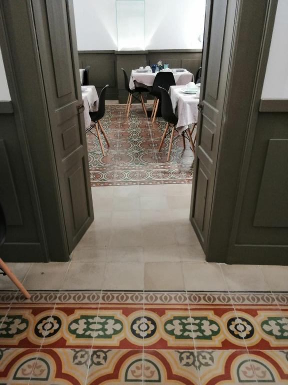 A restaurant or other place to eat at B&B VISTAZZURRA - Casa Saldarelli