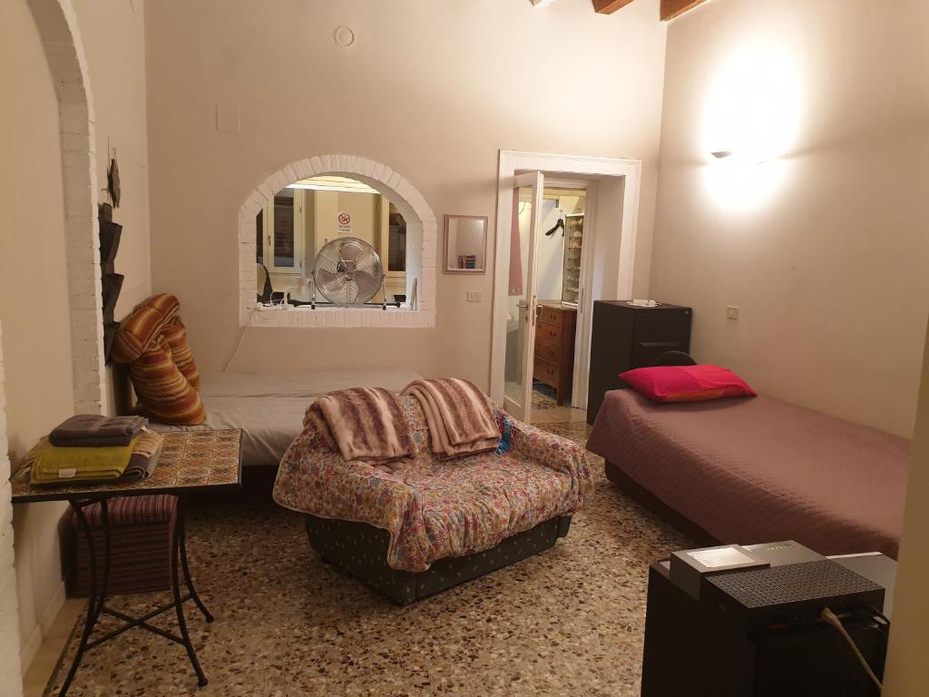 Postel nebo postele na pokoji v ubytování La Casa di Daniele