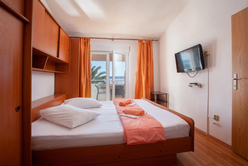 Posteľ alebo postele v izbe v ubytovaní Apartment A4 sea view Antonia