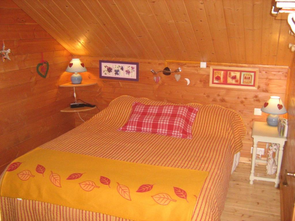 Postel nebo postele na pokoji v ubytování Chalet Gérardmer situé a LE THOLY