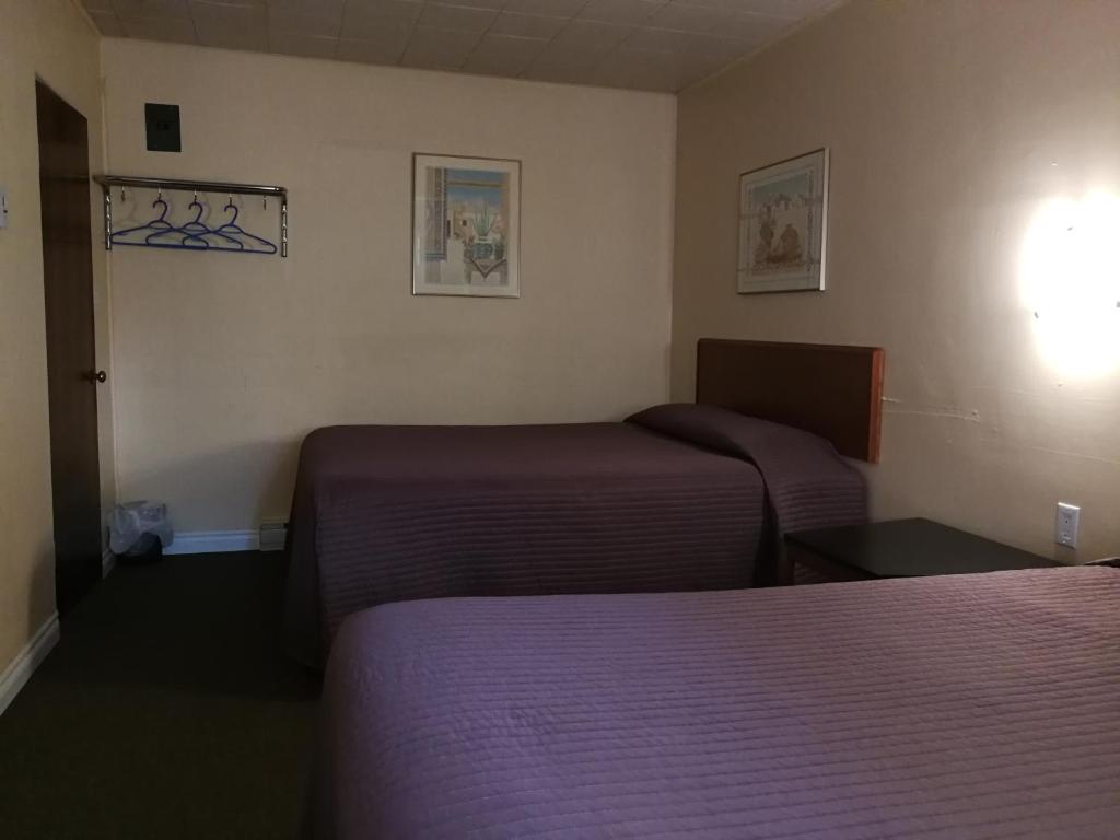 Postel nebo postele na pokoji v ubytování Star Motel