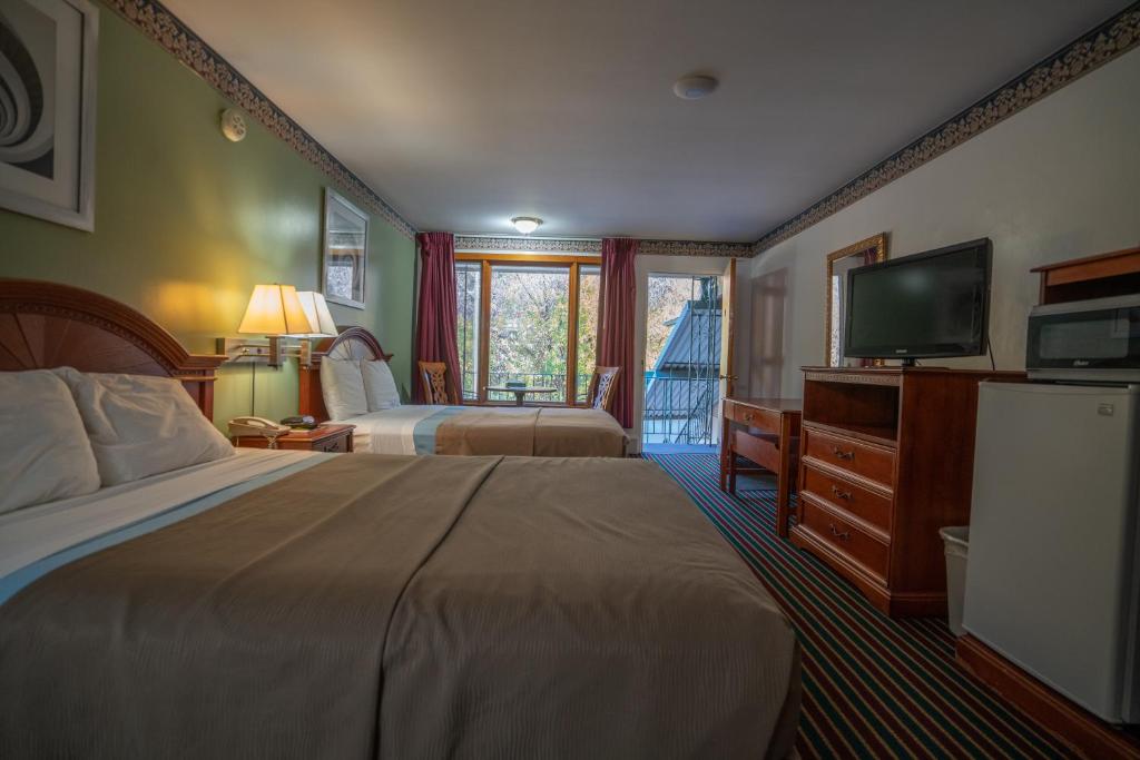 Ένα ή περισσότερα κρεβάτια σε δωμάτιο στο Mahoning Inn