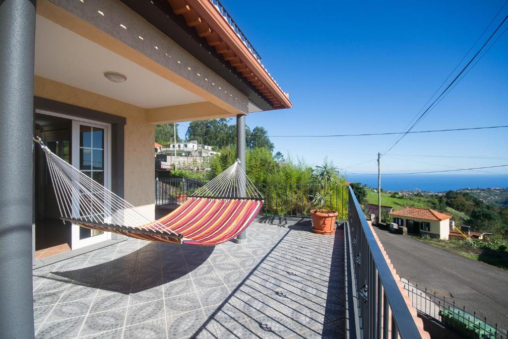 En balkon eller terrasse på Férias e Natureza, Conforto a norte da ilha