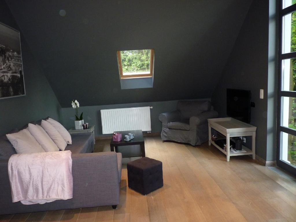 Posezení v ubytování B&B Des Heures Claires