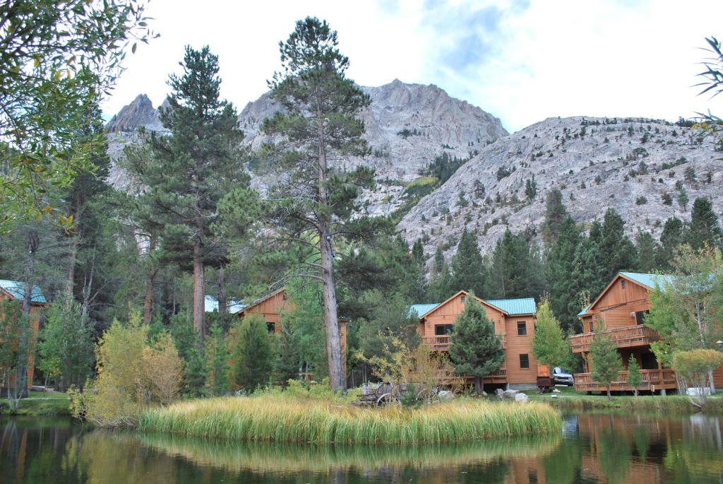 a group of houses in front of a mountain at Double Eagle Resort and Spa in June Lake