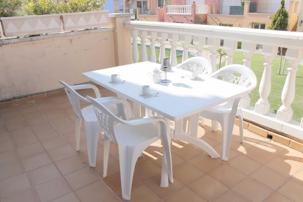 Balkón nebo terasa v ubytování casa cerca playa con piscina comunitaria ref 252