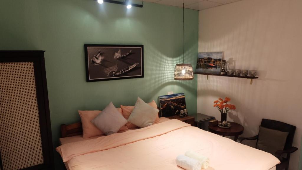 Postel nebo postele na pokoji v ubytování Little Nap Homestay