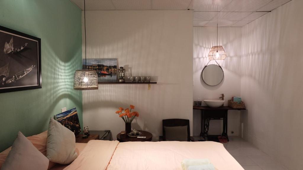 Postel nebo postele na pokoji v ubytování Little Nap Homestay