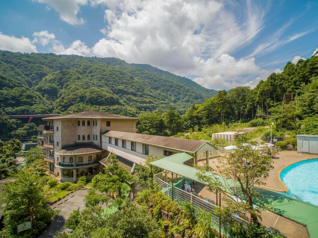 an aerial view of a resort with a pool at Hakonenomori Okada in Hakone