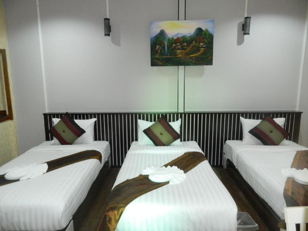 Postel nebo postele na pokoji v ubytování Pai Iyara Resort