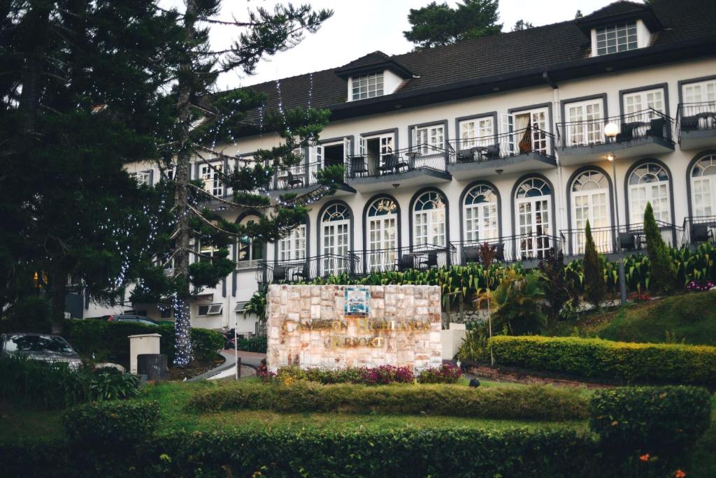 a large white building with alot of windows at Cameron Highlands Resort - Small Luxury Hotels of the World in Cameron Highlands
