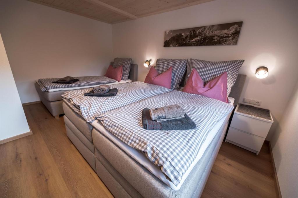 Posteľ alebo postele v izbe v ubytovaní Mayerl's Kaiserappartement