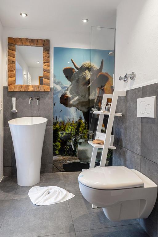 Koupelna v ubytování Almhotel Grünsteinblick