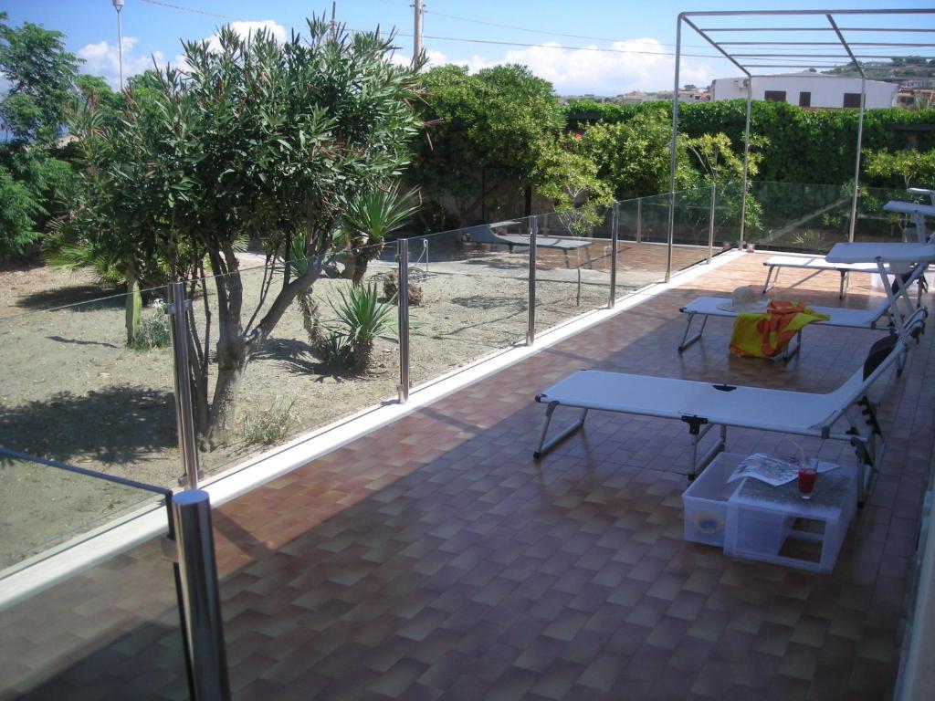 A balcony or terrace at Villa On The Beach Spiaggia Plaia