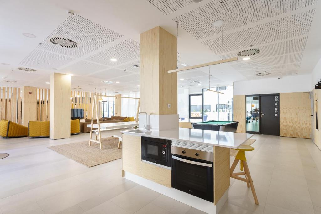 A kitchen or kitchenette at Residencia Universitaria Resa Campus Málaga