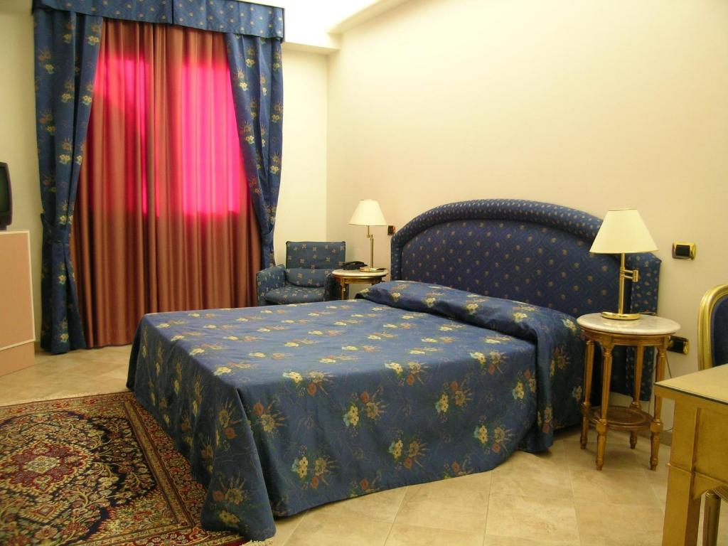 Posteľ alebo postele v izbe v ubytovaní Hotel Da Vito