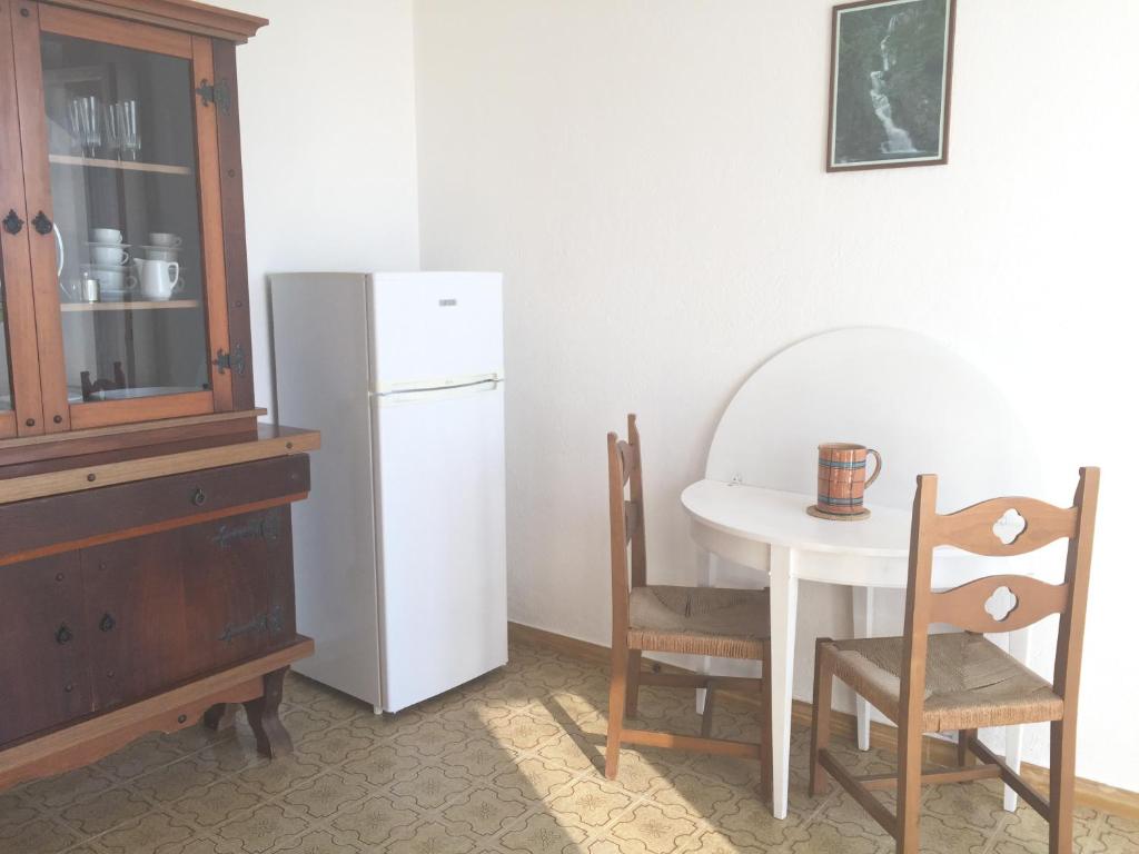 Kuchyň nebo kuchyňský kout v ubytování Residenza Gherly