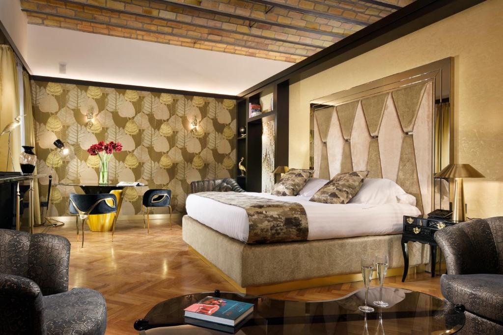 Uma área de estar em Lifestyle Suites Rome