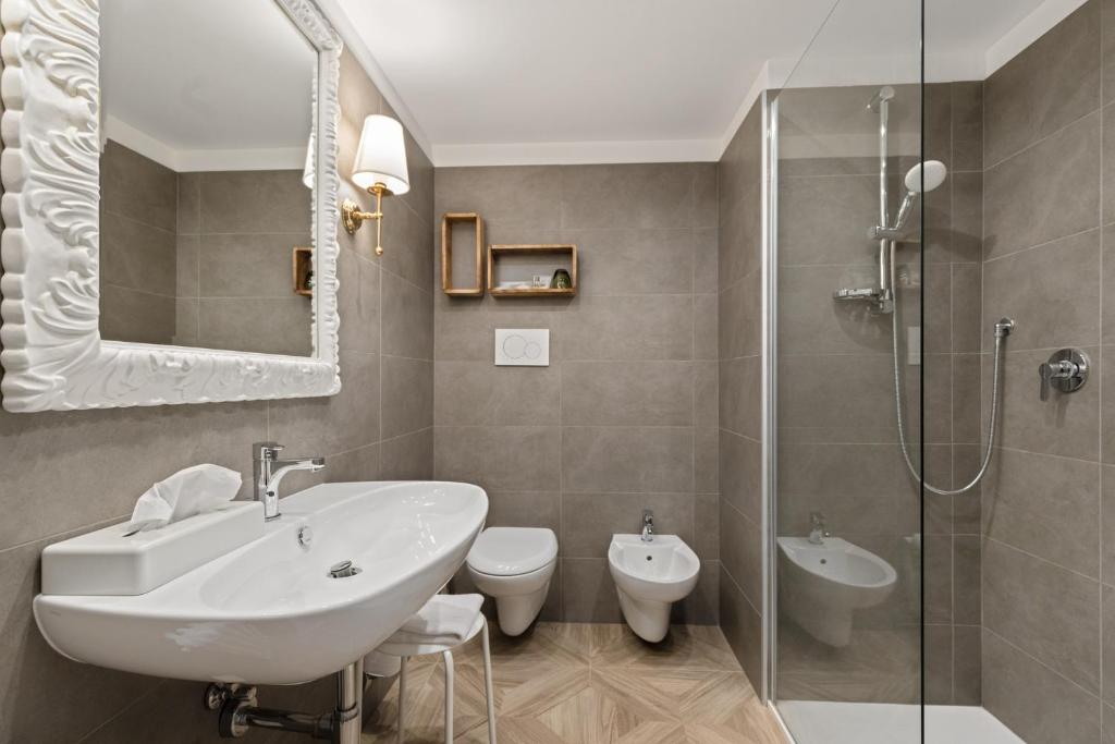 Koupelna v ubytování Hotel Leon d'Oro