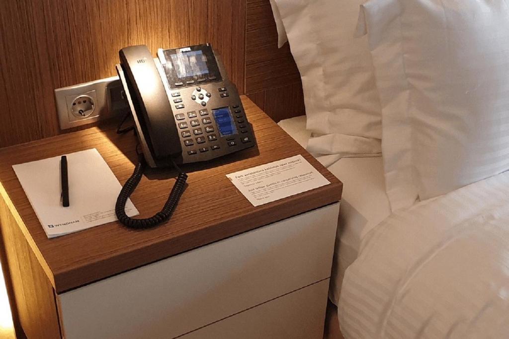 Postel nebo postele na pokoji v ubytování Wyndham Cerkezkoy