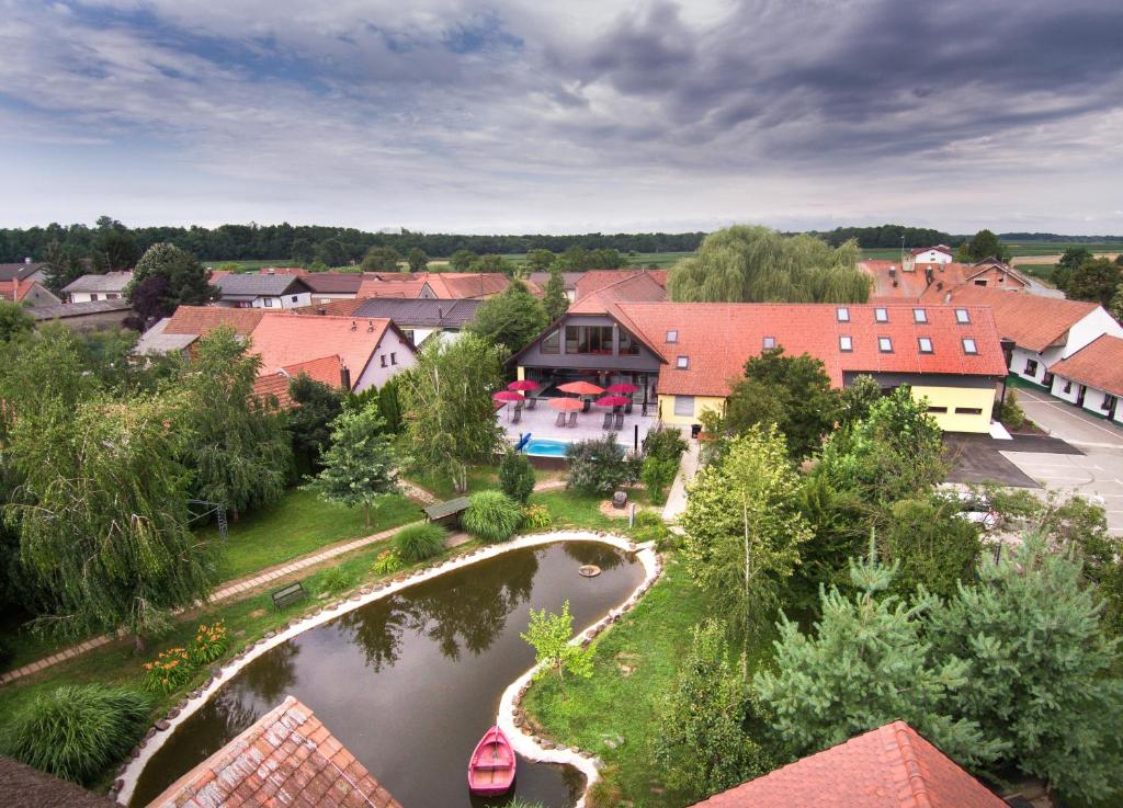 an aerial view of a town with a river at Hotel Strk in Murska Sobota