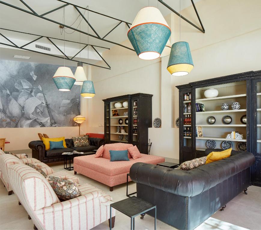 a living room with two couches and a couch at Trafalgar Polo Club in El Palmar