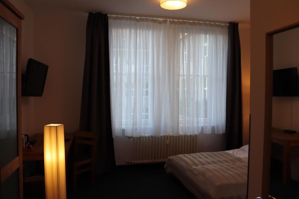 Postel nebo postele na pokoji v ubytování Hostel VITA Berlin